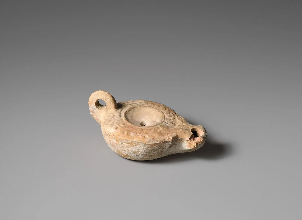 Terracotta oil lamp — Unknown