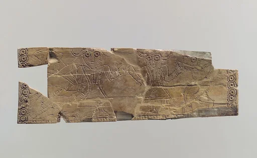 Plaque: bull-men on the obverse; lion attacking a horned animal on the reverse