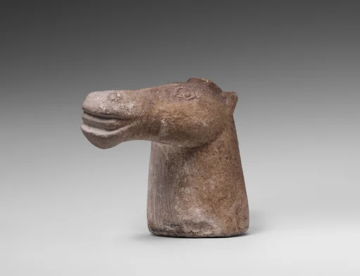 Horse-headed pestle (?)
