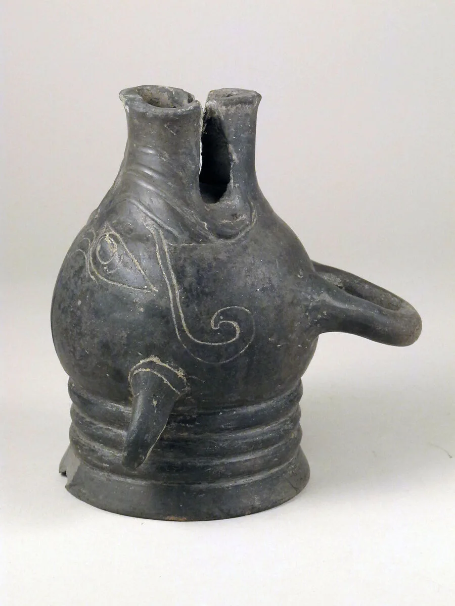 Cup in the form of a head of a pig — Unknown