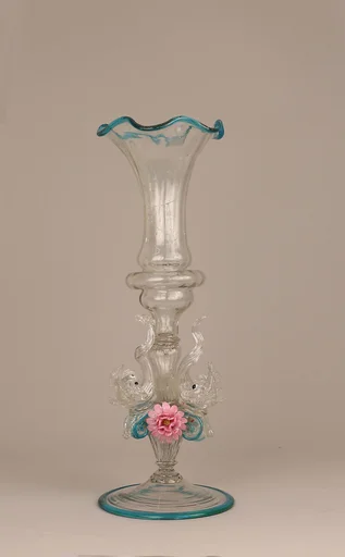 Fluted vase with dolphins