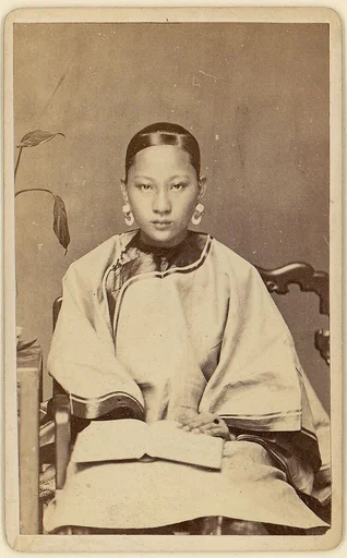 [Young Woman with Earrings]