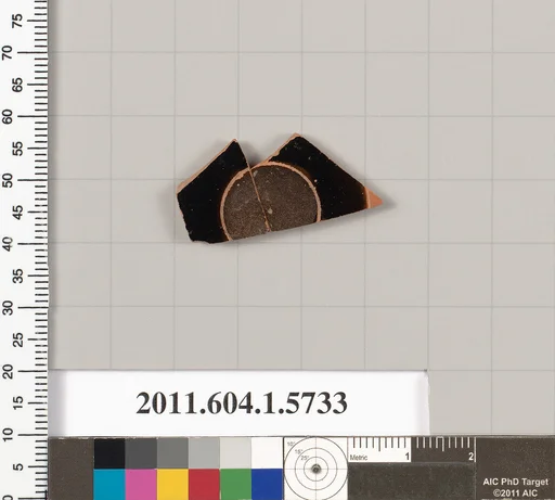 Terracotta fragment of a kylix: eye-cup (drinking cup)