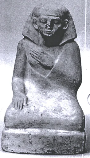 Statuette of a squatting man