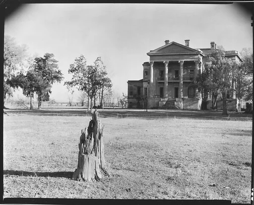 [Belle Grove Plantation with Tree Stump in Foreground, From Across Lawn, Louisiana]