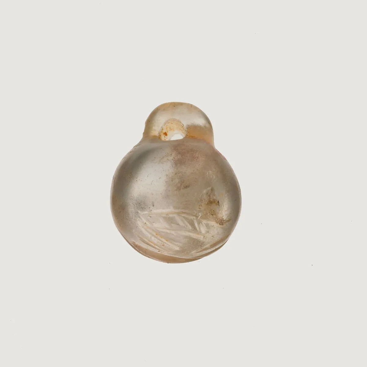 Rock crystal bead with striations — Unknown