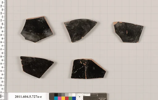 Terracotta fragments of kylikes (drinking cups)