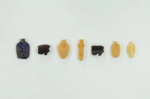 Group of 7 amulets