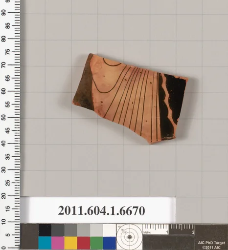 Terracotta fragment of a kylix (drinking cup)