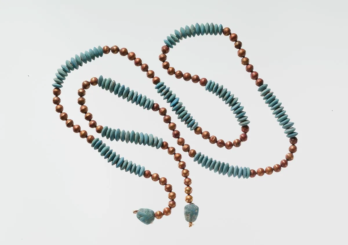 String of Beads with Feline-head Amulets — Unknown