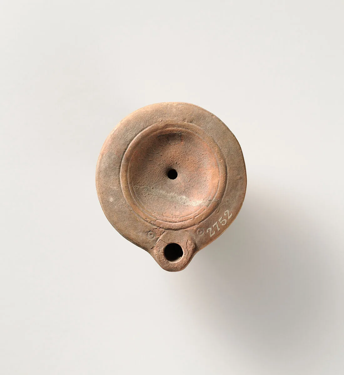 Terracotta oil lamp — Unknown