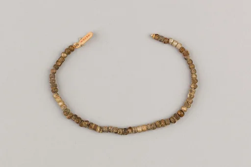 String of 61 spheroid beads