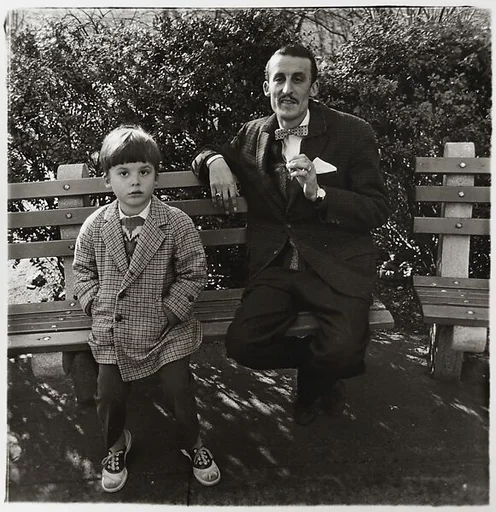 Man and a boy on a bench in Central Park, N.Y.C. 