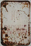 [Rusted Metal Sign: "No Parking"]