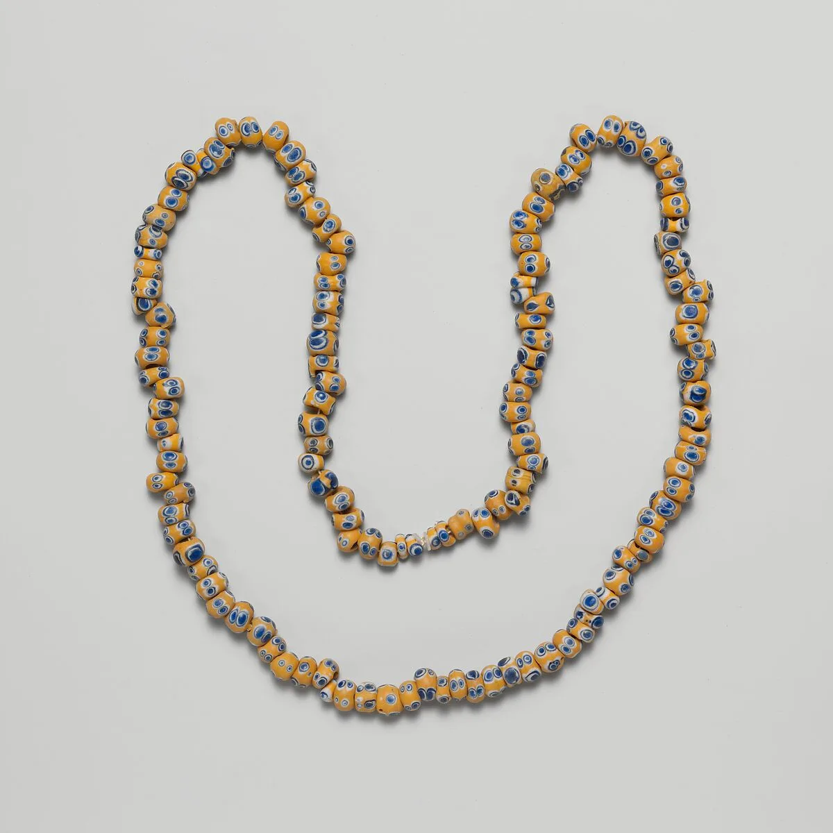 Glass eye beads — Unknown