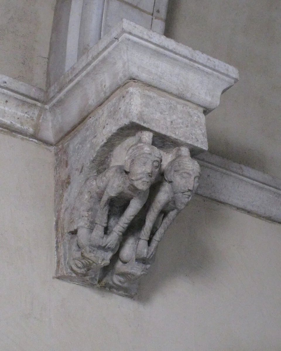 Corbel with Two Men with Legs in the Mouth of Two Beasts — Unknown
