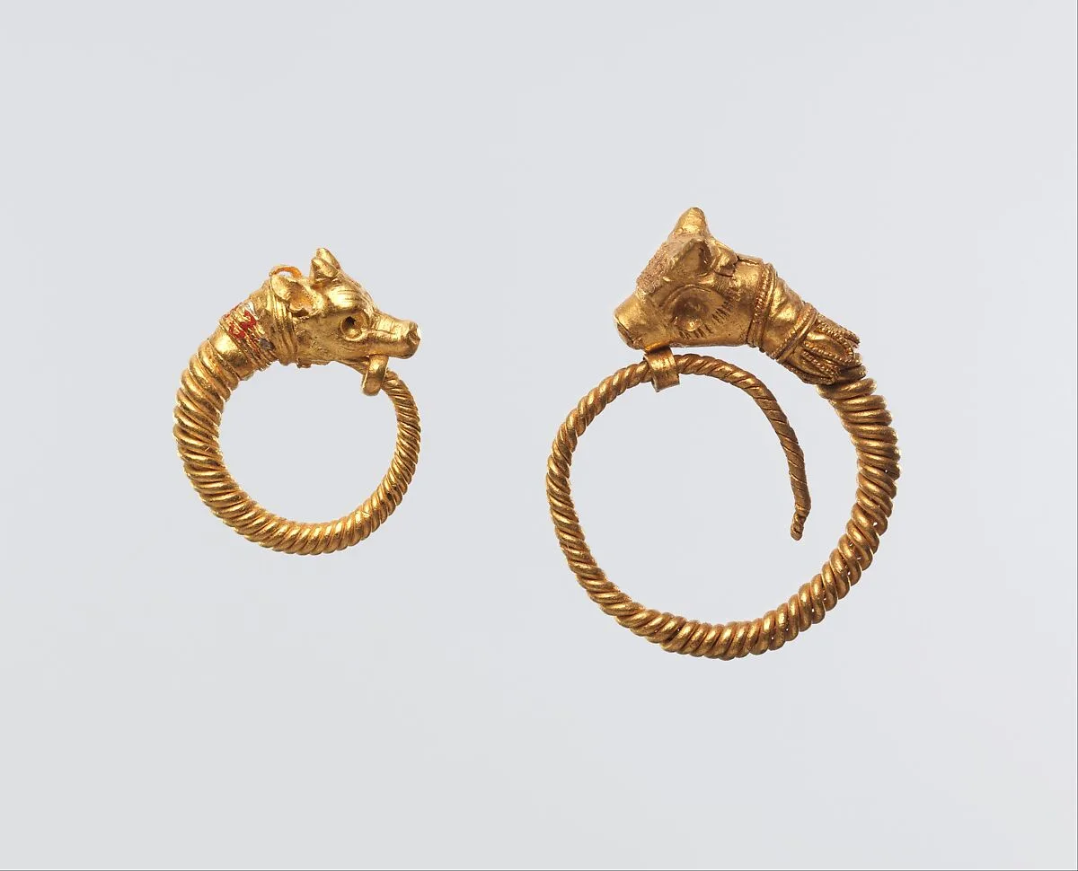 Earring with bull head terminal — Unknown
