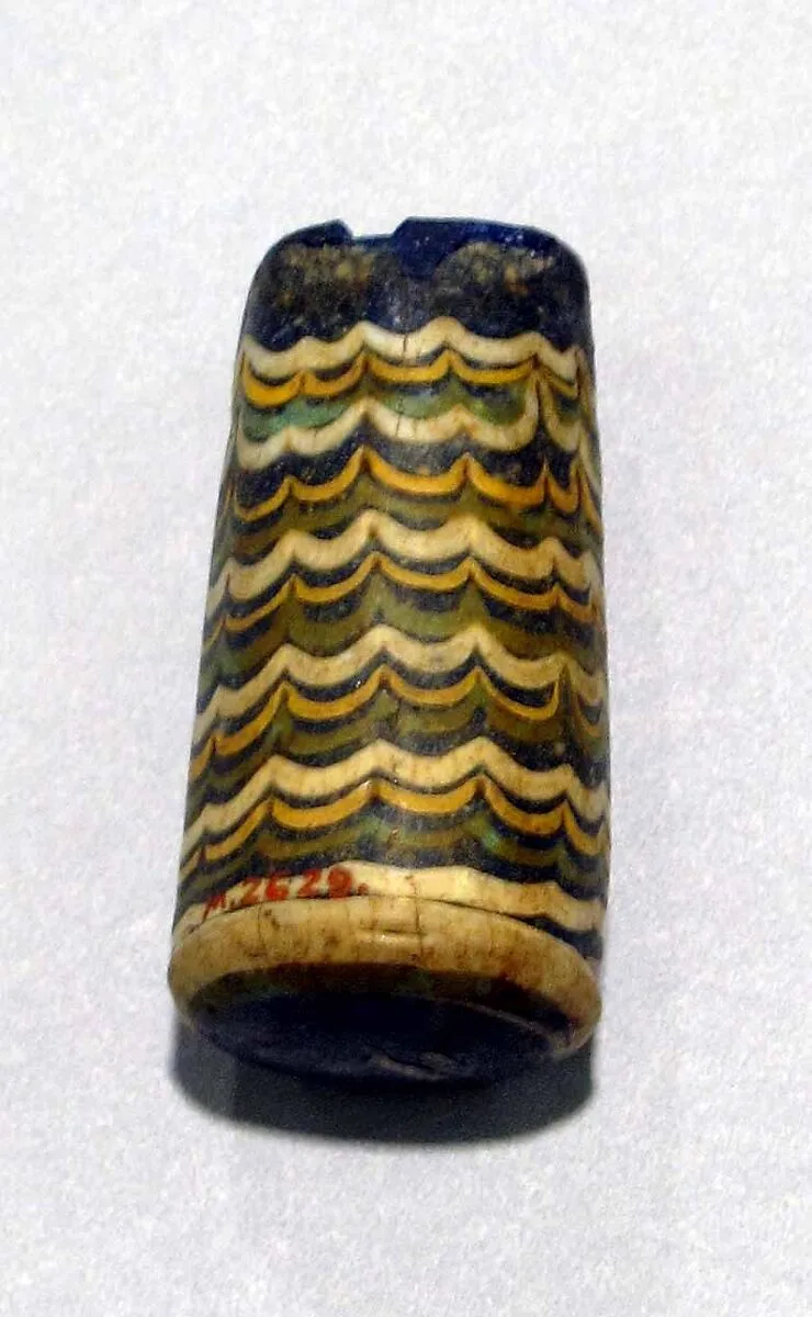Kohl Tube in the form of a Palm Column — Unknown