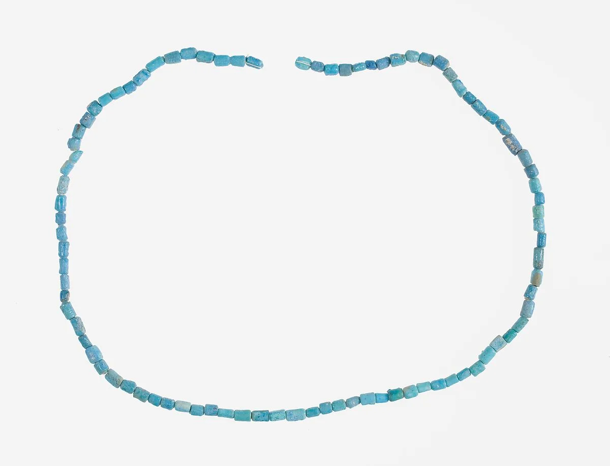 String of Short Cylindrical Beads — Unknown