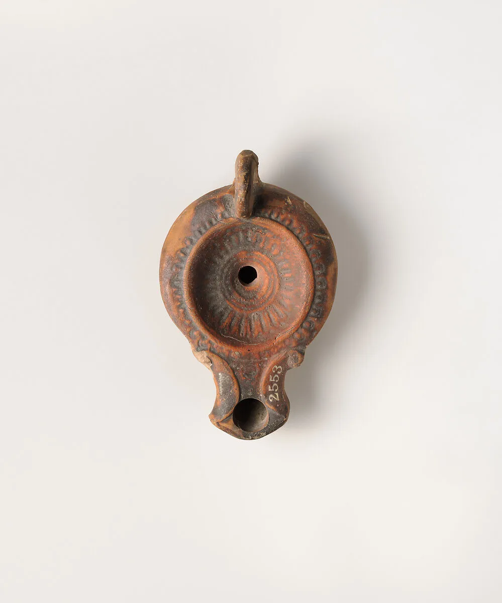 Terracotta oil lamp — Unknown