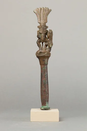Papyrus pillar surmounted by Bes with an antelope