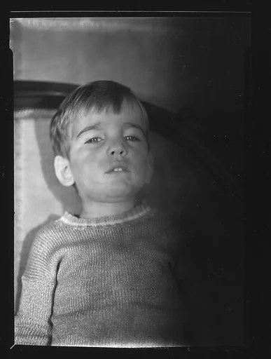 [Unidentified Child Wearing Sweater]