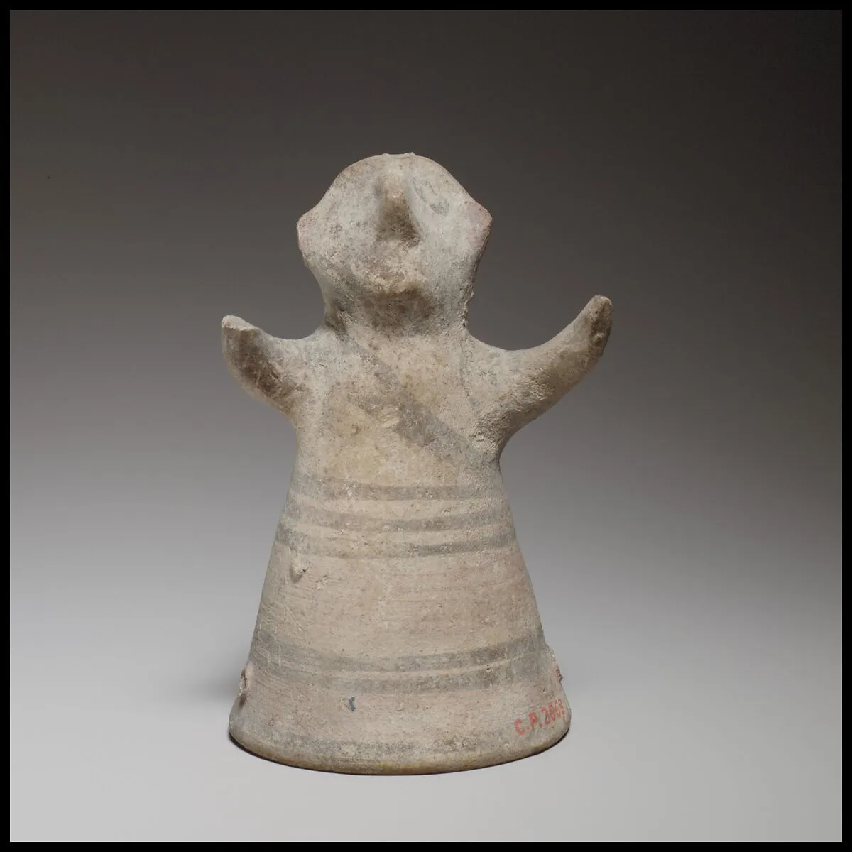 Standing male figurine with uplifted arms — Unknown
