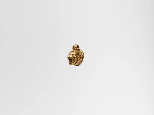 Gold pendant in the form of a lion's head