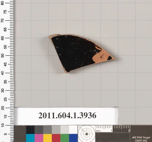 Terracotta fragment of a kylix (drinking cup)