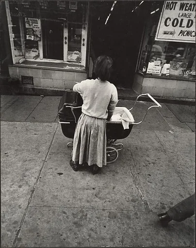 [Young Girl in White Sweater Holding Baby Stroller, New York]