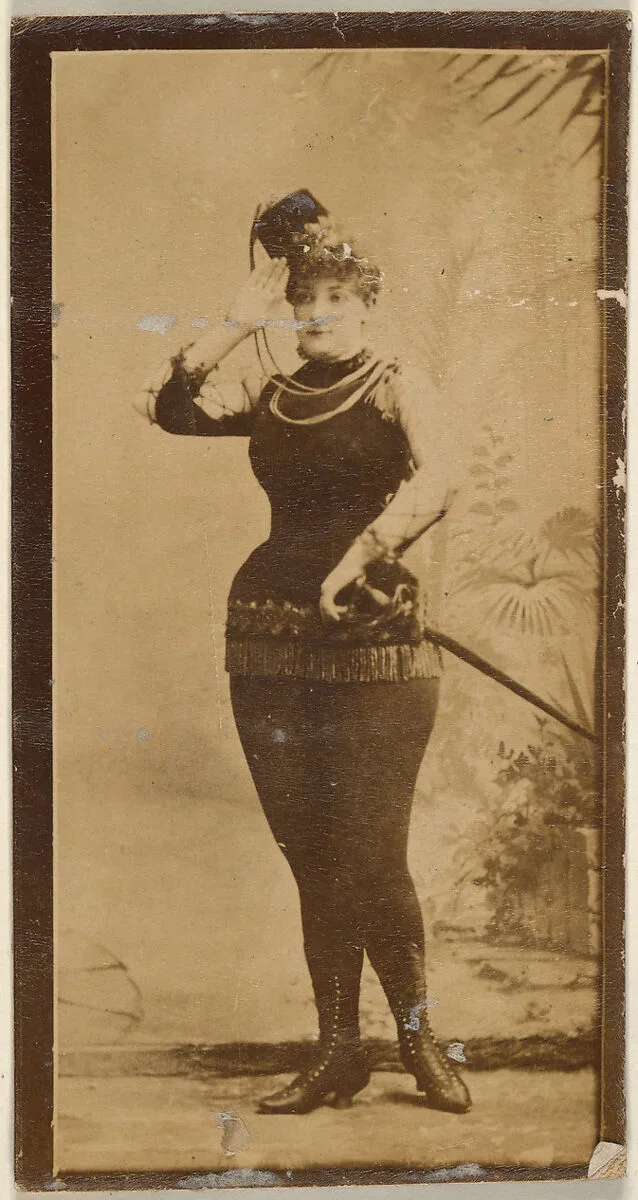 Actress saluting and wearing costume with sword, from the Actresses series (N668) — Unknown