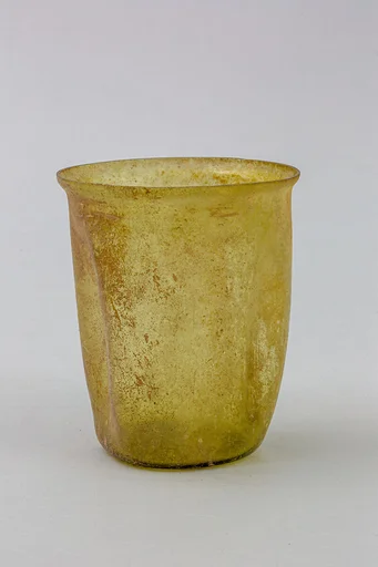 Glass indented beaker