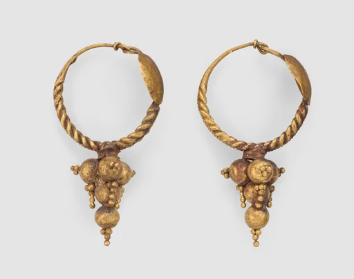Hoop earrings with disk and with conical pendant of balls and granules