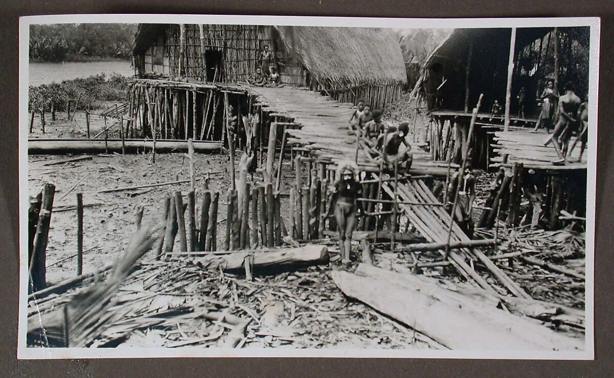 Men on Plank Walkway — Dr. Paul Baron de Rautenfeld