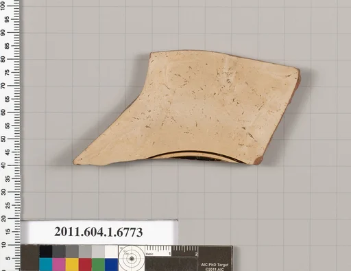Terracotta fragment of a kylix (drinking cup)