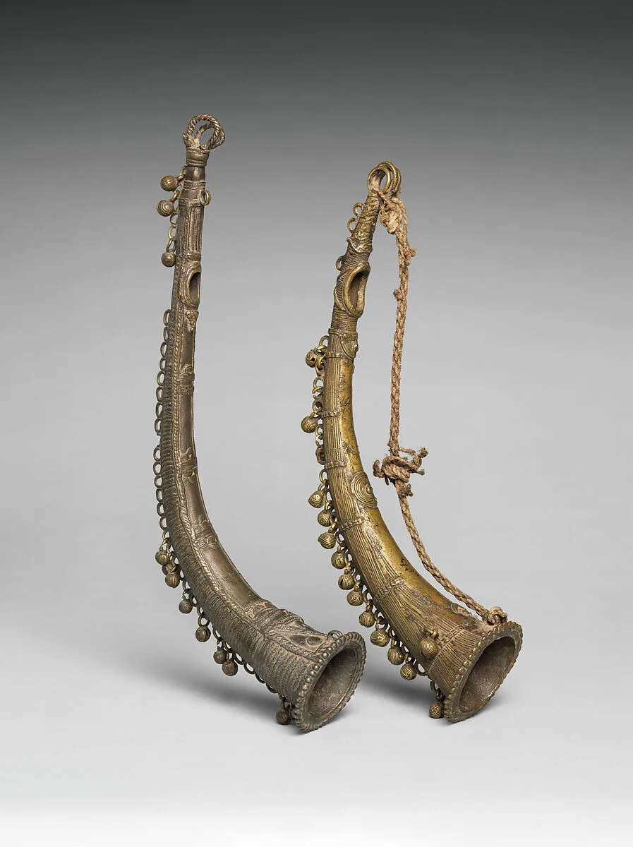 Two Cast Brass Side Blown Horns (Turi) — Unknown