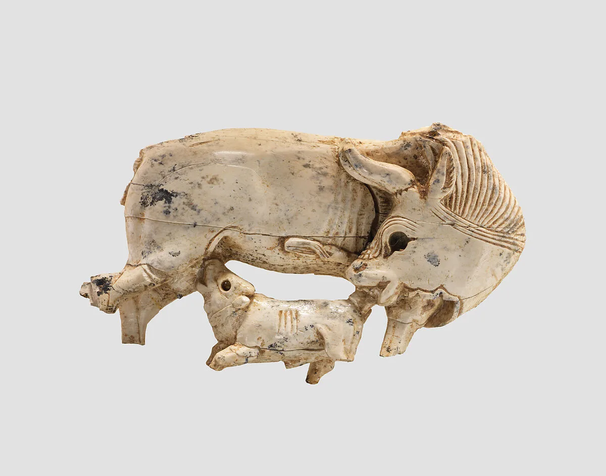 Openwork furniture plaque with a cow suckling a calf — Unknown