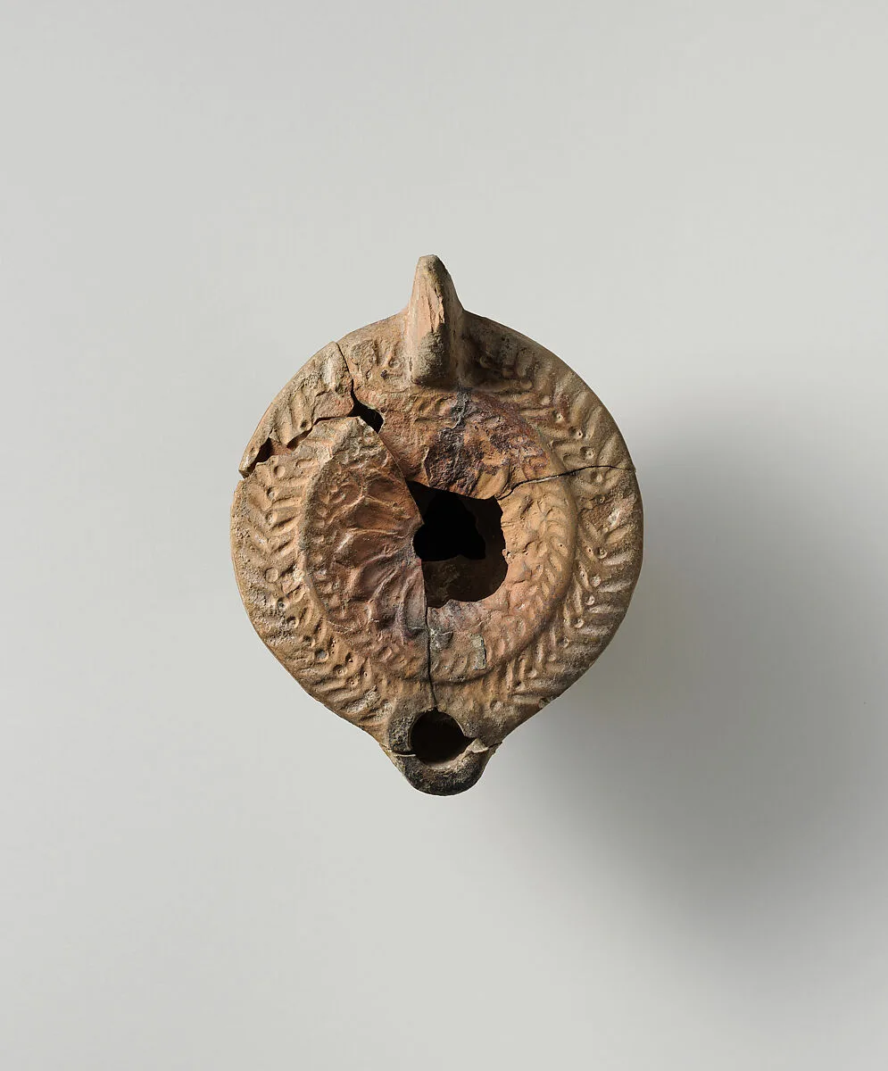 Terracotta oil lamp — Unknown