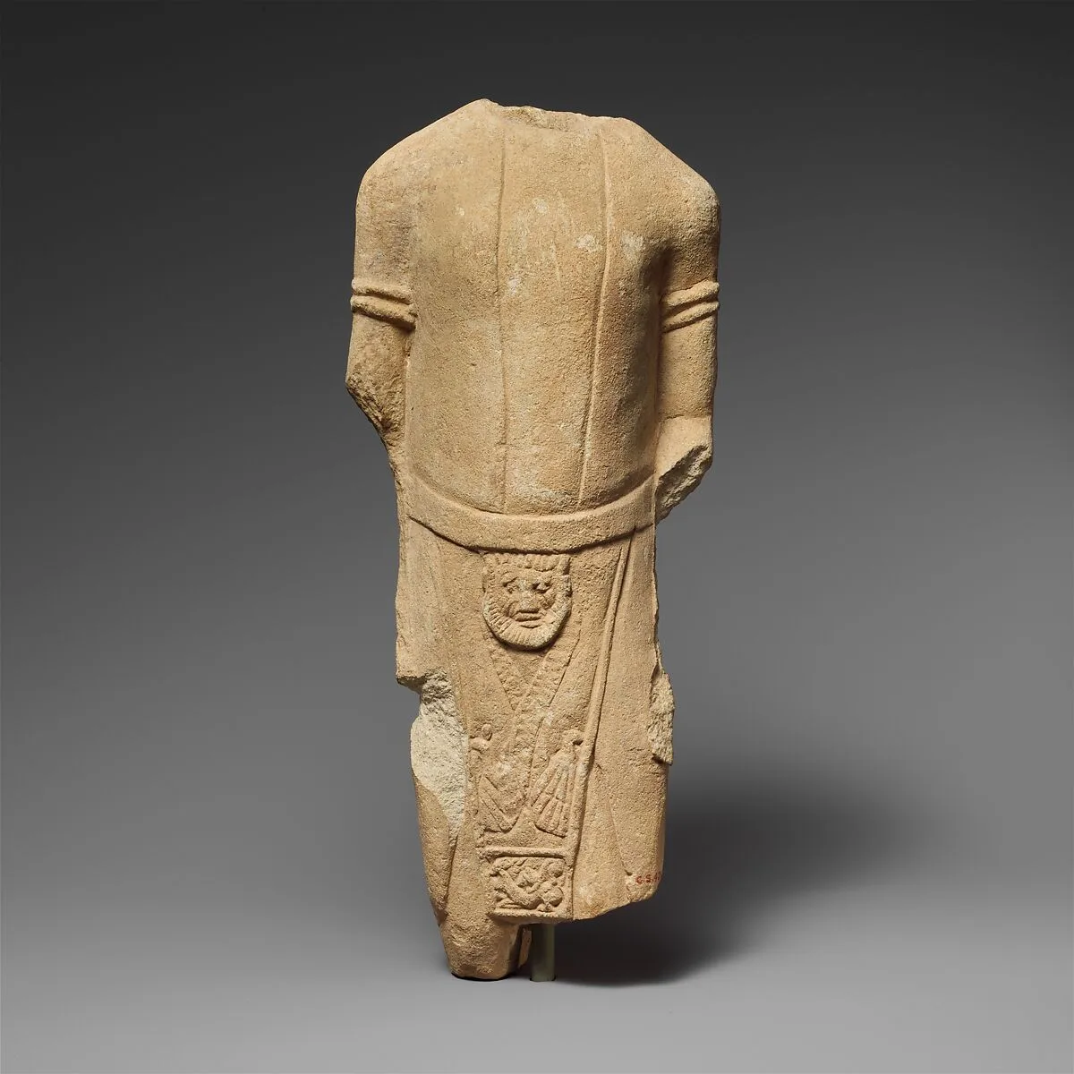 Limestone statuette of a male votary in Egyptianizing dress — Unknown