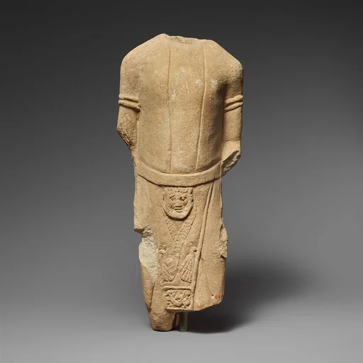 Limestone statuette of a male votary in Egyptianizing dress