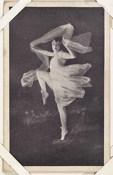 Actress in costume as dancer, dark background (W423) — Unknown