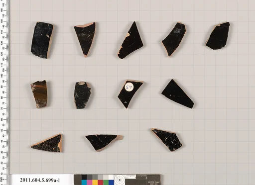 Terracotta fragments of kylikes (drinking cups)