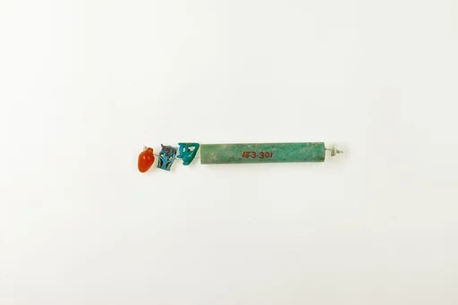 String of 3 amulets and 1 cylindrical bead