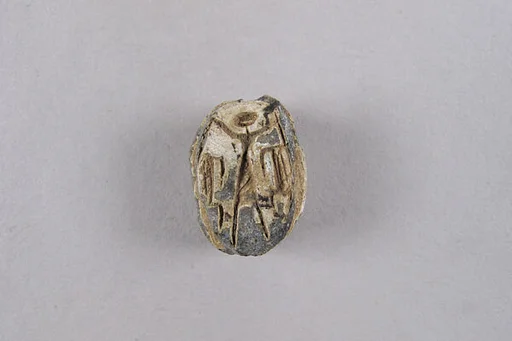 Scarab with Master of the Animals Holding Crocodiles