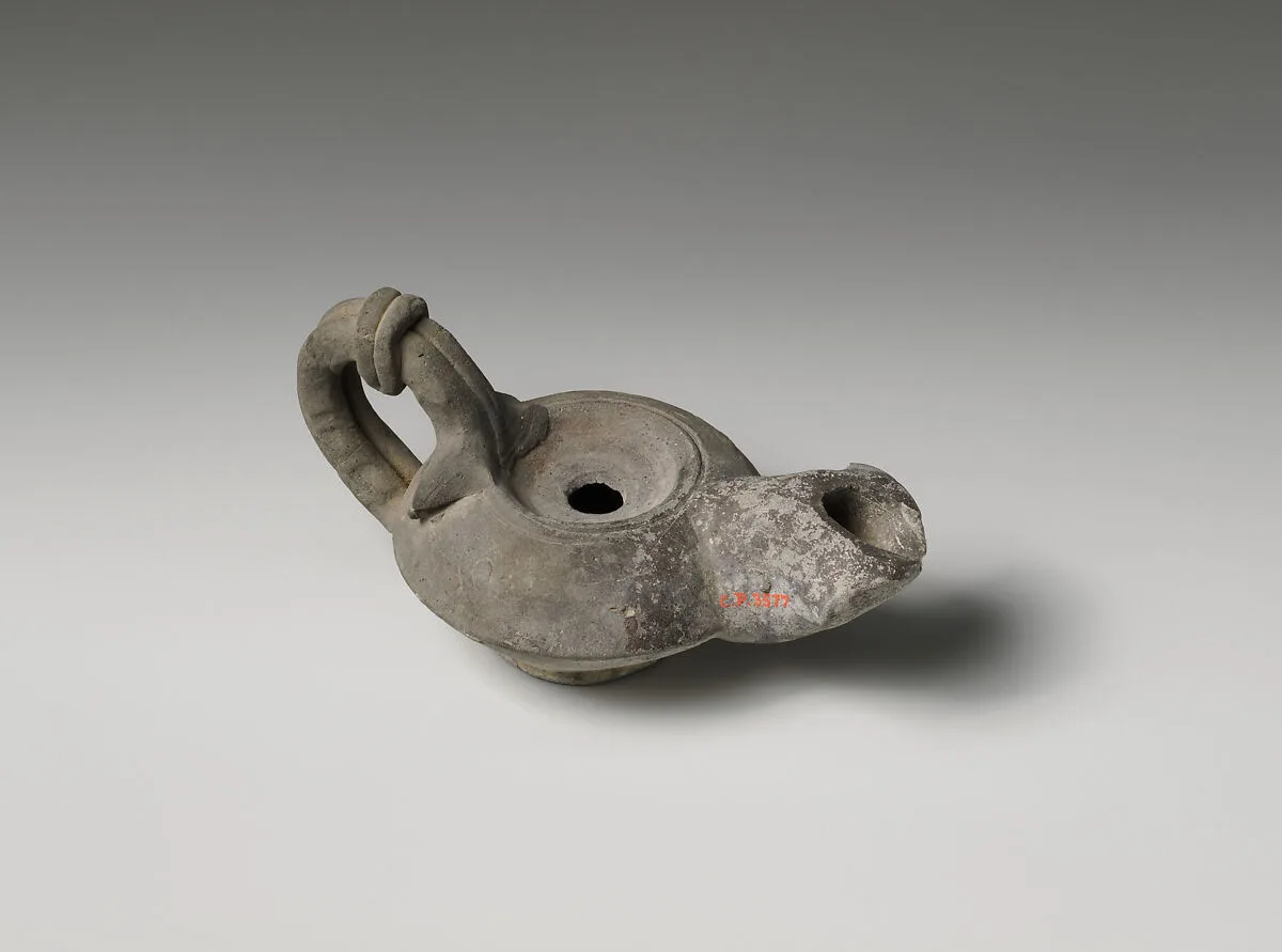 Terracotta oil lamp — Unknown