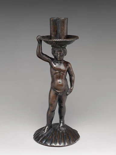 Boy on a shell, holding a candlestick