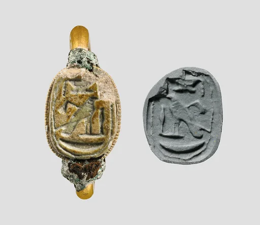 Gold ring with glass scarab