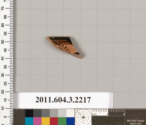 Terracotta rim fragment of a kylix (drinking cup)