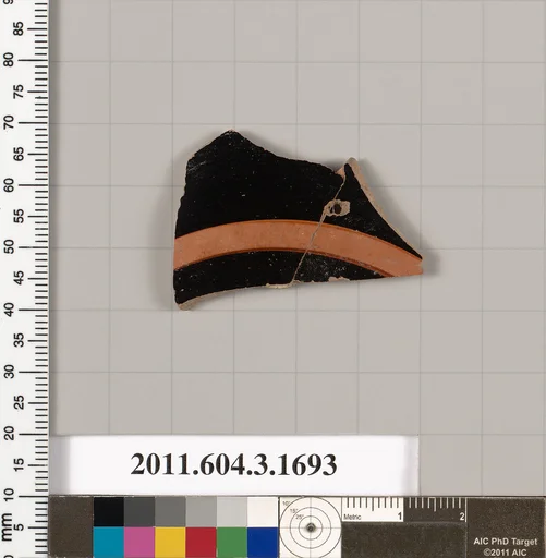 Terracotta fragment of a kylix: Band or lip cup (drinking cup)