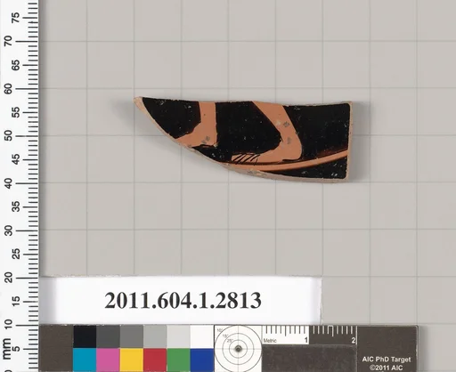 Terracotta fragment of a kylix (drinking cup)